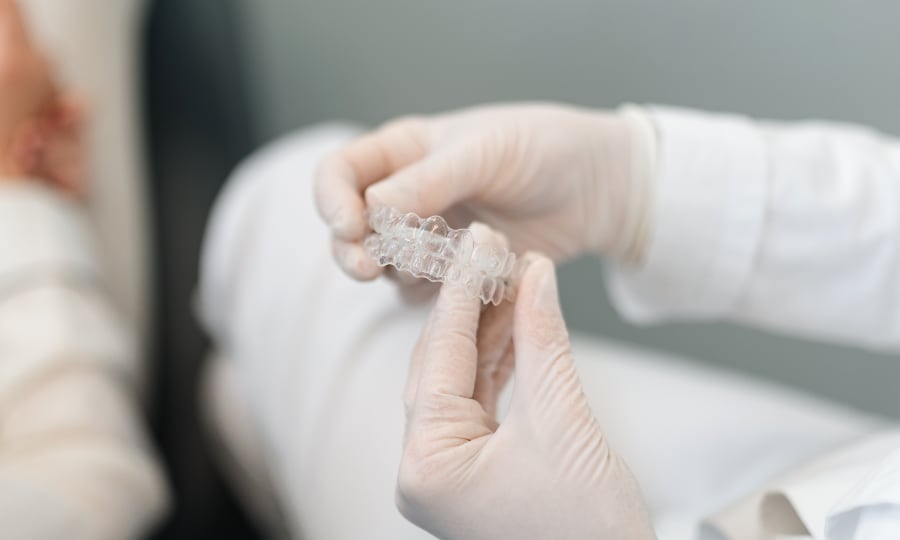A close up image of an Invisalign tray.